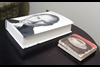 Reading material, Walter Isaacson’s book on Apple co-founder Steve Jobs, sits on a table.
