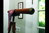 An antique ship’s telescope is on display in Basche’s home office.