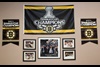 Bruins 2011 Stanley Cup champions banners, and photos including Jacobs with father Jeremy and brother Charlie.