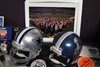 Helmets and photo of the North Texas Super Bowl Host Committee, on which Curtis served.