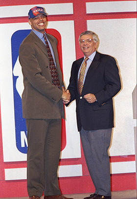 John Thomas with NBA commissioner David Stern at the 1997 draft. (Craig Jones/Allsport/Getty Images)